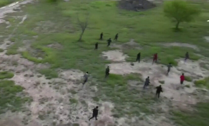 Fox News spots migrant group running across southern border into US