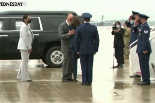 Kamala Harris, Second Gentleman kiss while wearing masks