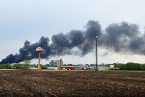 Fiery train derailment in Iowa forces town to evacuate residents