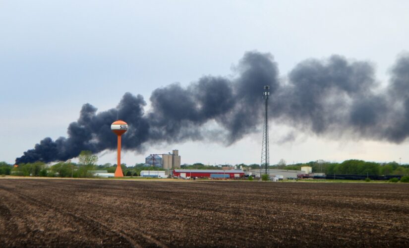 Fiery train derailment in Iowa forces town to evacuate residents