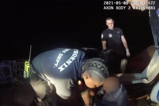 Arizona police officers save man from drowning after his wheelchair tips over into canal, video shows