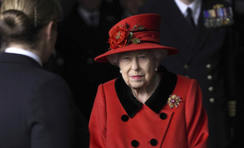 Queen Elizabeth pays tribute to Prince Philip while visiting navy carrier