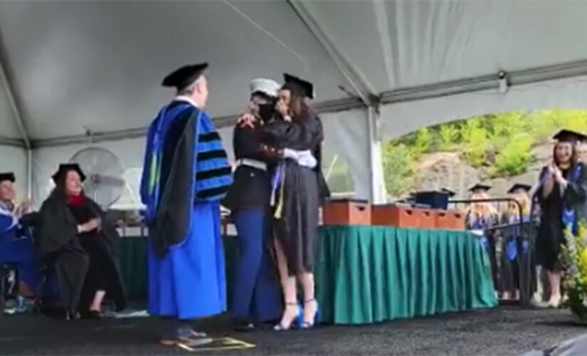 Marine surprises sister at college graduation after a year apart due to the pandemic