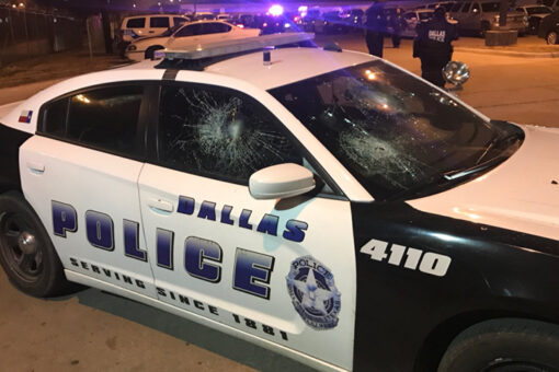 Gun battle at Dallas strip mall leaves 8 injured, including 2 kids, police say