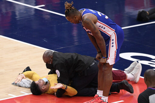 Fans Gone Wild: Spectator tries to get on floor at NBA game