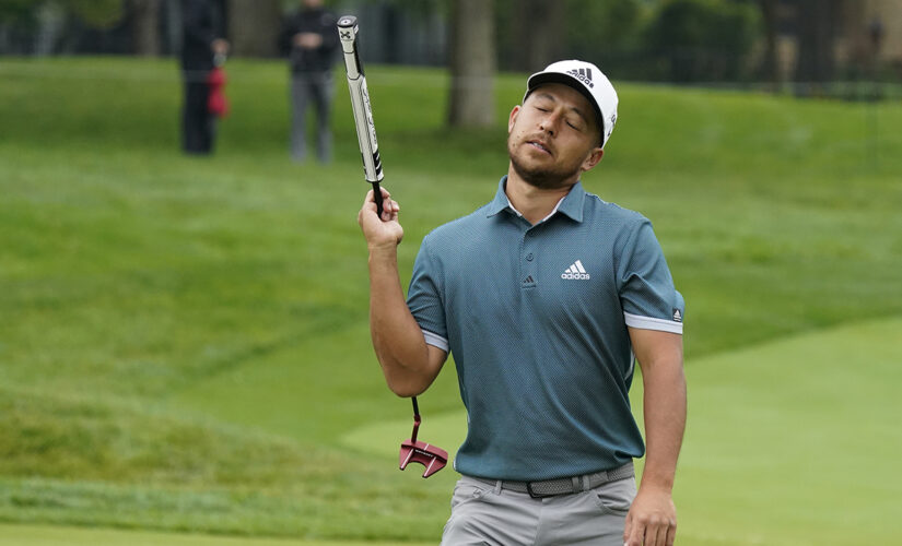 Morikawa leads at Muirfield Village on day suspended by rain