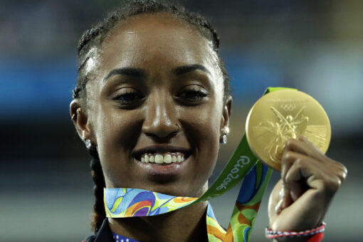 Olympic champ Rollins-McNeal banned 5 years in doping case