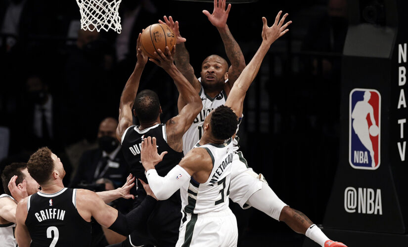 Durant, Irving carry Nets in opener after Harden hurt