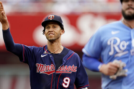 Sanó starts triple play, Twins edge Royals 2-1