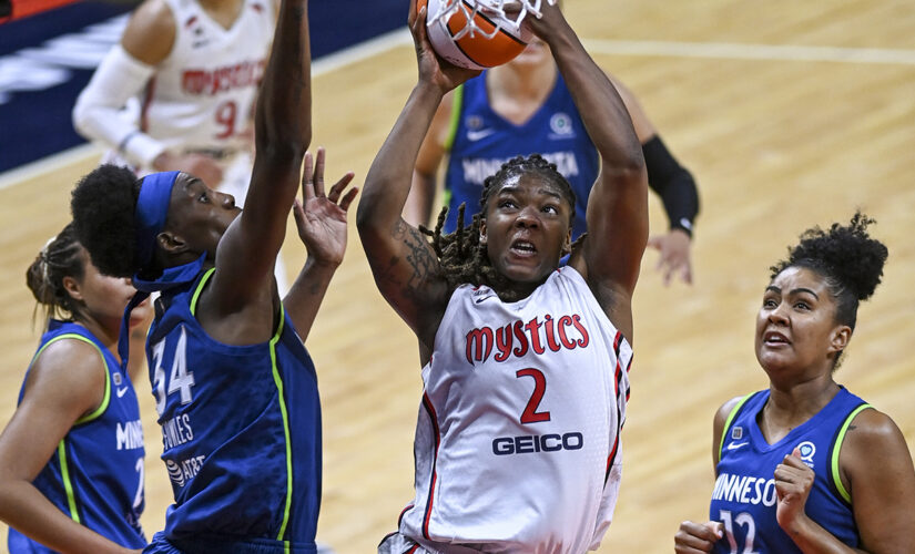 Charles scores 31, Mystics hold off Lynx 85-81