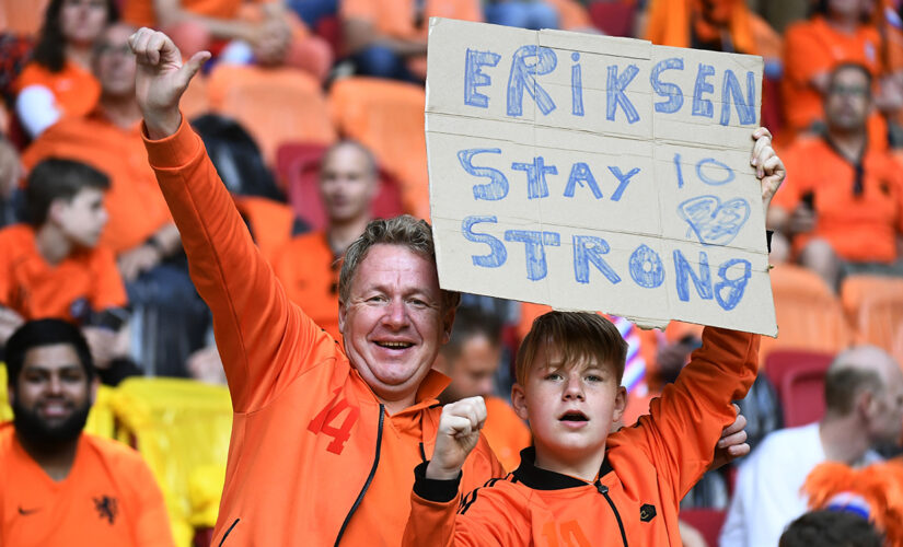 Fans in Amsterdam show support for Eriksen