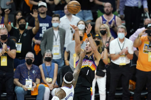 Booker gets first triple-double, Suns beat Clippers 120-114