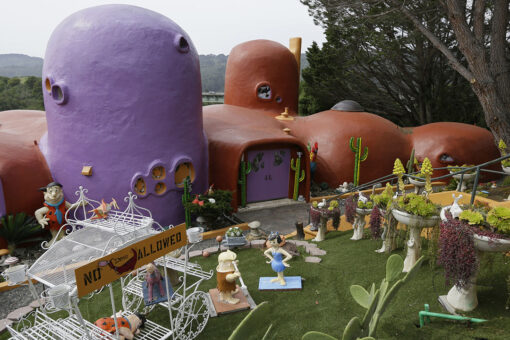 Flinstone house owner settles with California town, will be allowed to keep cartoon-inspired additions