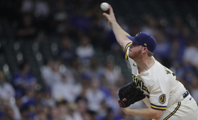 Woodruff excels, Brewers edge Cubs 2-1 for 7th straight win