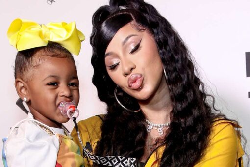 Cardi B reveals baby bump during BET Awards performance