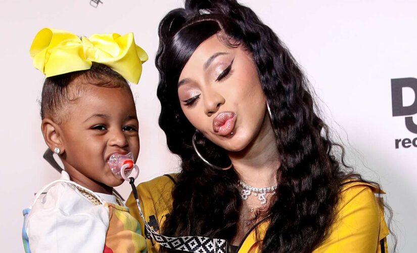 Cardi B reveals baby bump during BET Awards performance