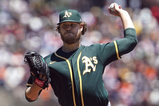 Irvin fans 8, A’s beat Giants 6-2 to avoid 3-game sweep