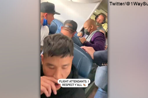 Delta flight attendant tackles would-be hijacker, zip-ties his wrists: video
