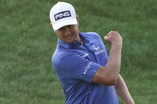 English wins Travelers, beating Hickok in 8-hole playoff