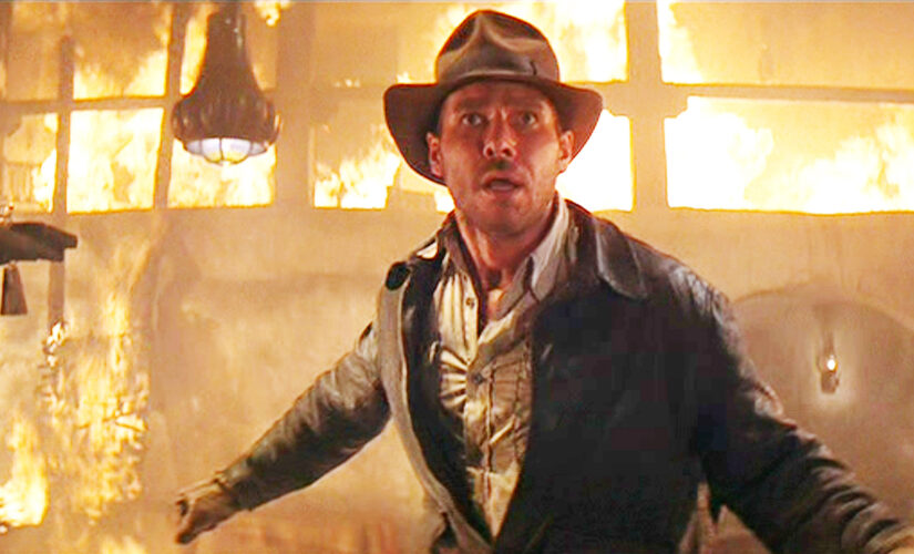 Harrison Ford pictured in Indiana Jones costume on set of fifth movie