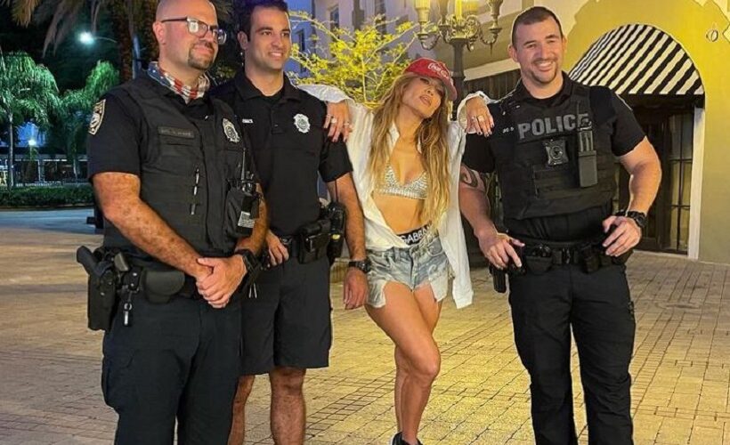 Jennifer Lopez poses for photo with Miami Beach police officers during video shoot