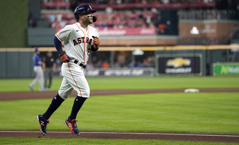 Altuve slugs way into MLB history as Astros down Rangers 8-4