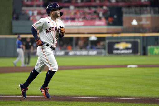 Altuve slugs way into MLB history as Astros down Rangers 8-4