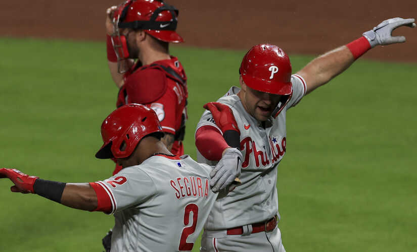 Herrera, McCutchen each hit 2 of Phils’ 7 HRs, bop Reds 17-3