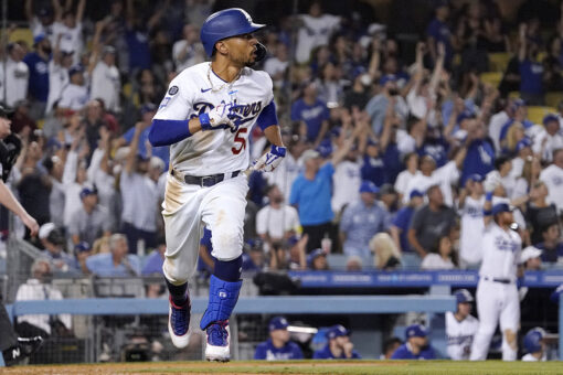 Betts homer in front of 52,078 leads Dodgers over Phillies