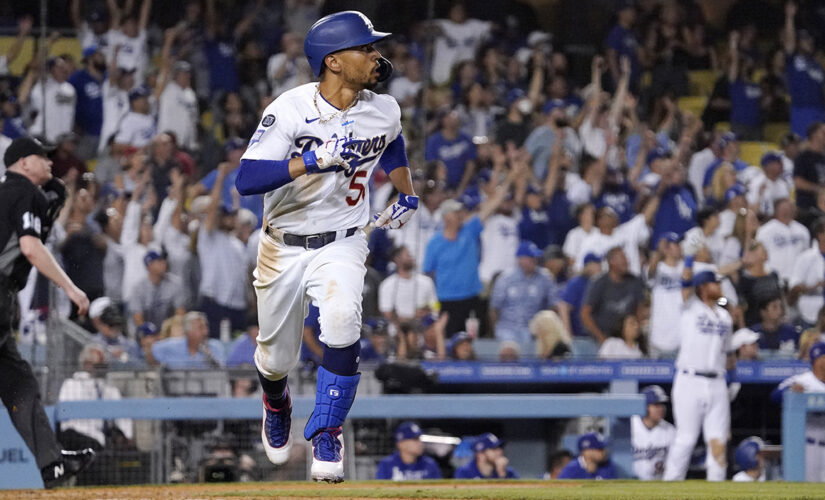 Betts homer in front of 52,078 leads Dodgers over Phillies