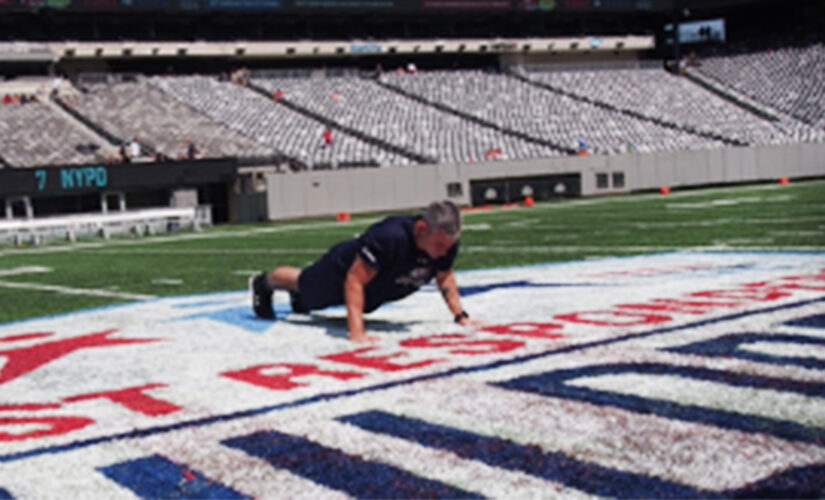 Wisconsin father sets new pushup world record to raise money for family of fallen first responders