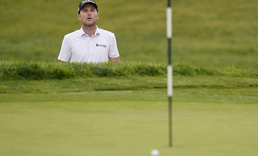 Henley leads fog-delayed Open as Koepka makes presence felt