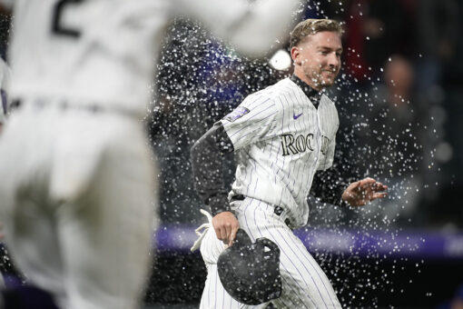 Rox win on wild pitch in 11th; Texas’ 13th road loss in row