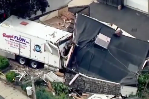 Boston-area man plows stolen truck into house, guns down 2 people before being shot dead by police