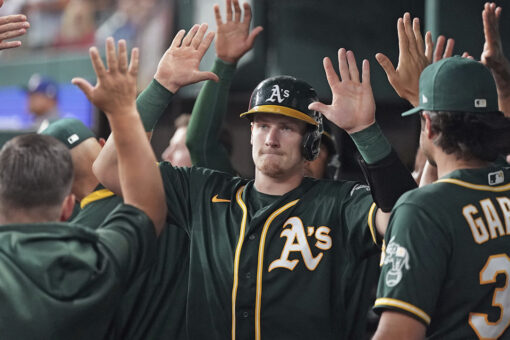 Athletics race to large, early lead, defeat Rangers 13-6