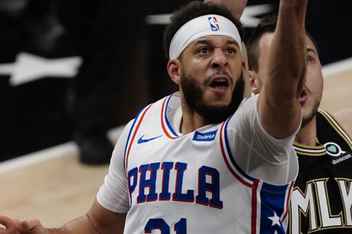 Curry, Harris help 76ers stay alive, hold off Hawks 104-99