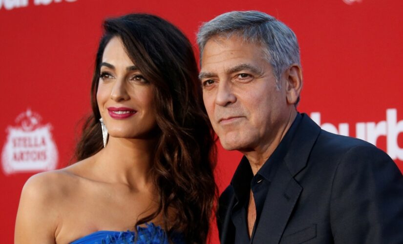 George and Amal Clooney return to Italy with twins: report