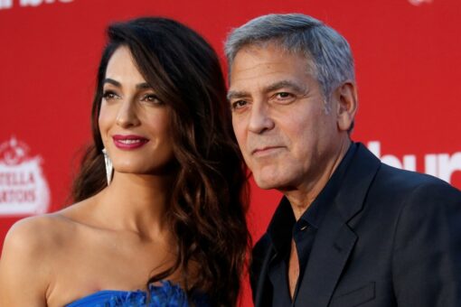 George and Amal Clooney return to Italy with twins: report
