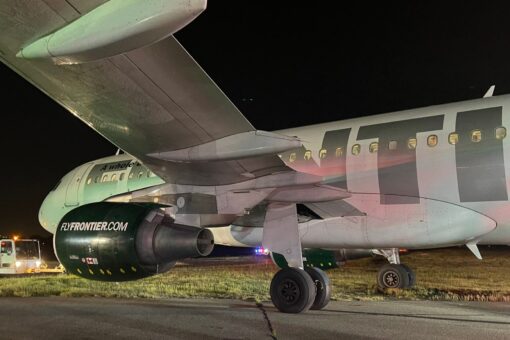 Frontier Airlines plane overshoots runway at Reagan airport near D.C., comes to a stop in the grass