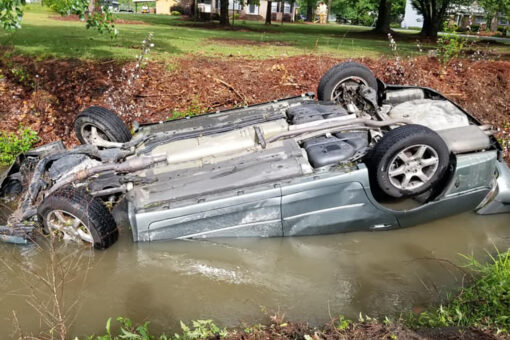North Carolina police officers hailed as heroes after rescuing woman from overturned, submerged vehicle
