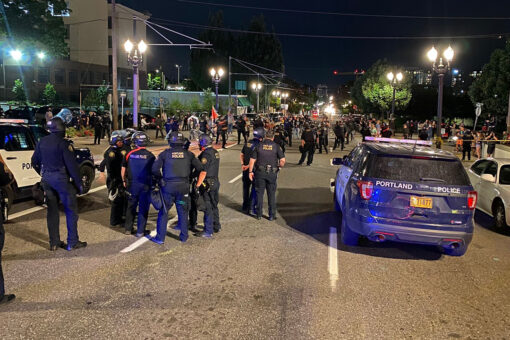 Mob gathers in Portland after deadly officer-involved shooting; some throw items at officers
