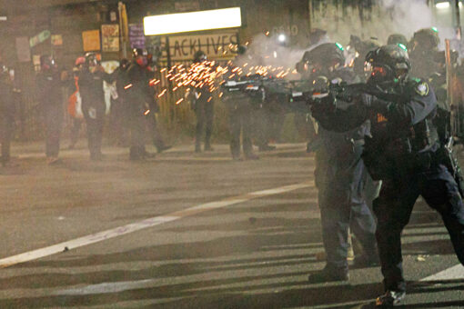 Portland’s police riot team resigns after officer indicted over alleged assault on photographer