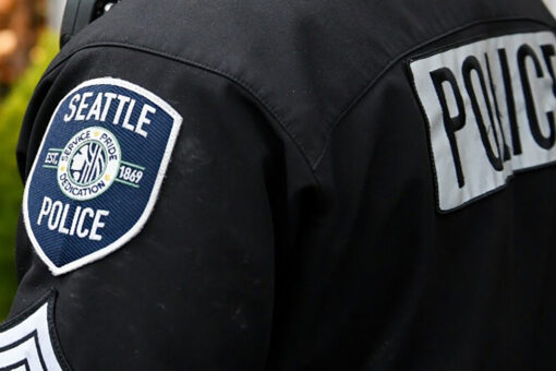 Seattle cop hit, killed on freeway while helping another driver involved in a crash; officer’s car stolen