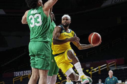 Mills leads Australia past Nigeria, 84-67 in Olympic opener