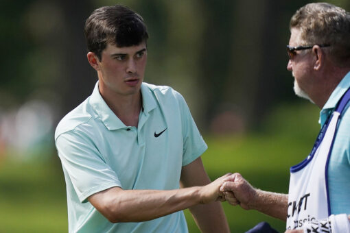 Davis Thompson shoots 63, takes early lead at Rocket Classic