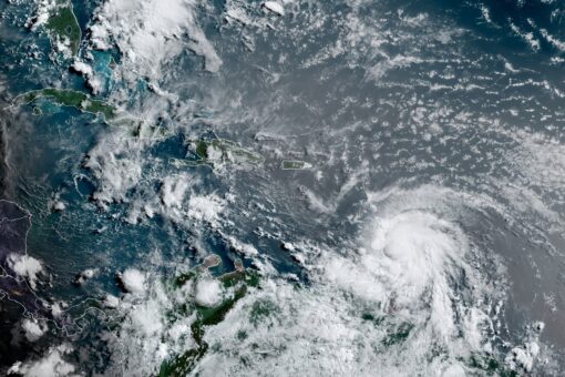 Elsa strengthens to hurricane status, further complicating condo collapse search efforts