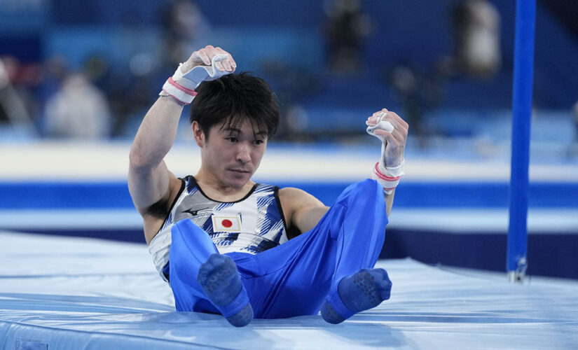 Japan surges to gymnastics lead; Reigning champ Uchimura out