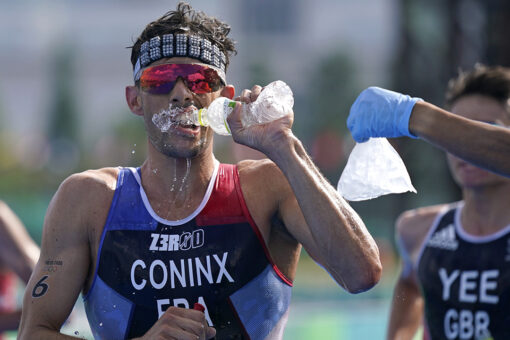 Pandemic Olympics endured heat, and now a typhoon’s en route