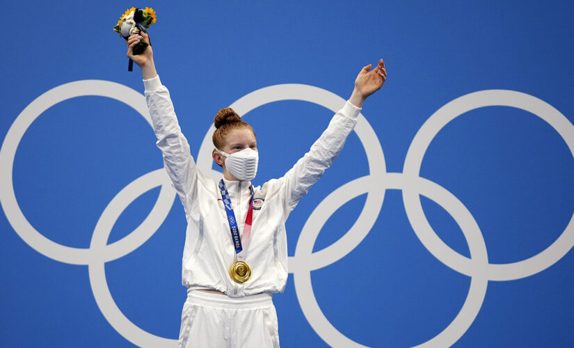 Small Alaska town embraces state’s 1st swimmer to win gold