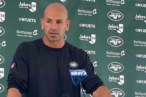 Jets report for camp with heavy hearts, Wilson unsigned